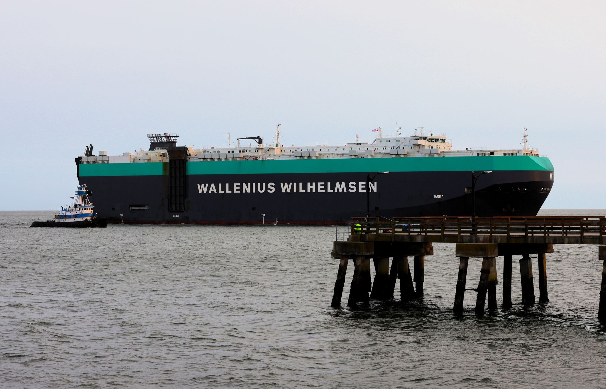 RoRo car carrier vessel berthed at a harbor terminal